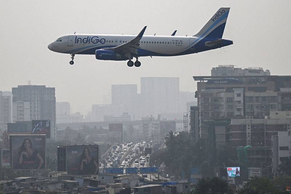 An IndiGo Airways aircraft prepares to land at the Mumbai airport on December 6, 2025. (AFP)