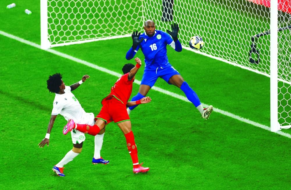 Soccer Football - FIFA Arab Cup - Qatar 2025 - Group B - Oman v Comoros - Stadium 974, Doha, Qatar - December 8, 2025
Oman's Issam Al Sabhi scores their second goal REUTERS