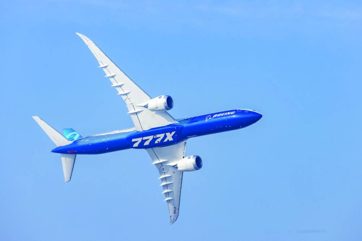 An experimental Boeing 777X aircraft during a flying display at the Dubai Air Show. Boeing booked 164 gross airplane orders in November, with almost half of those for the hulking 777X jetliners, to extend its sales lead over Airbus.