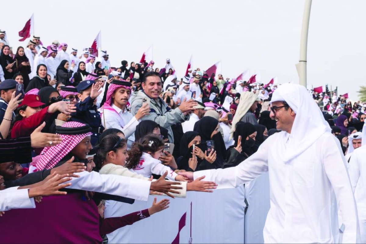 His Highness the Amir, along with other dignitaries, walked through the parade route and greeted and interacted with the crowd.