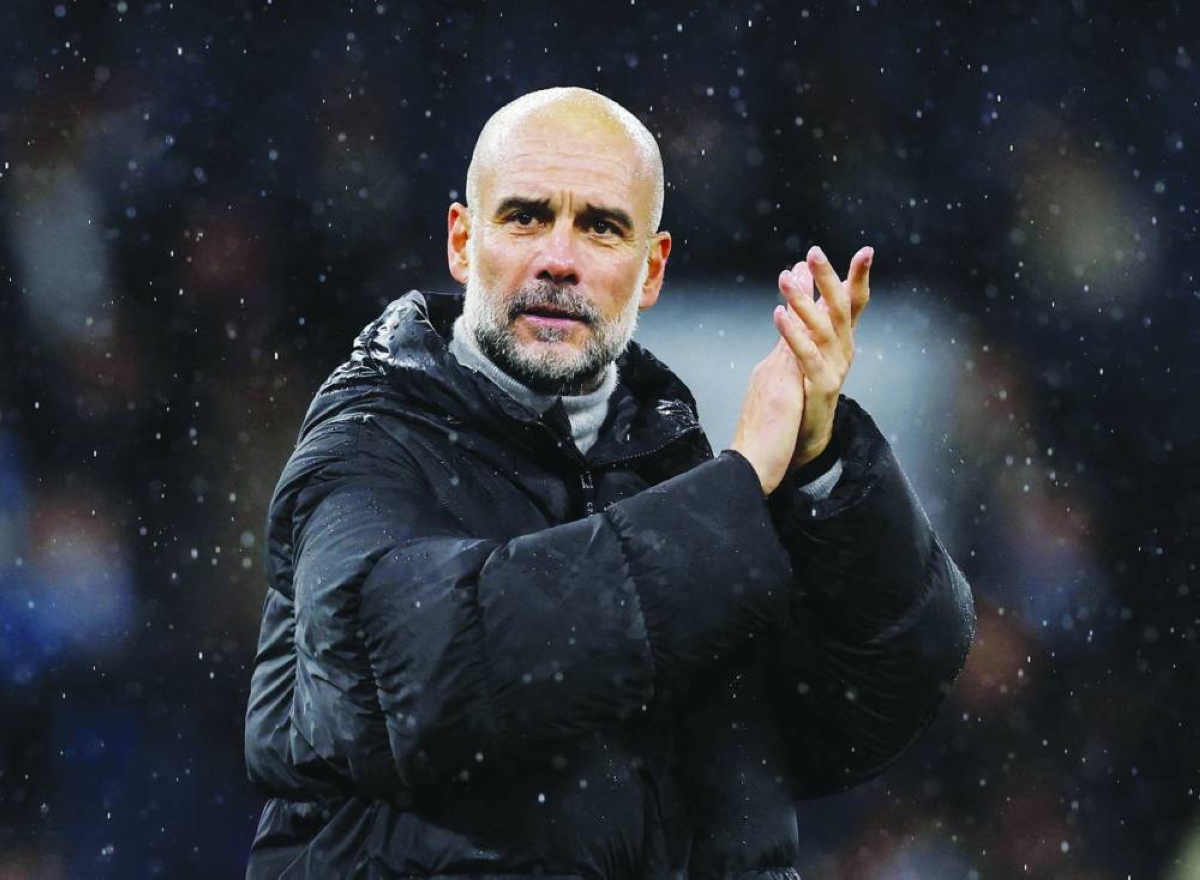 Manchester City manager Pep Guardiola celebrates after the match Action