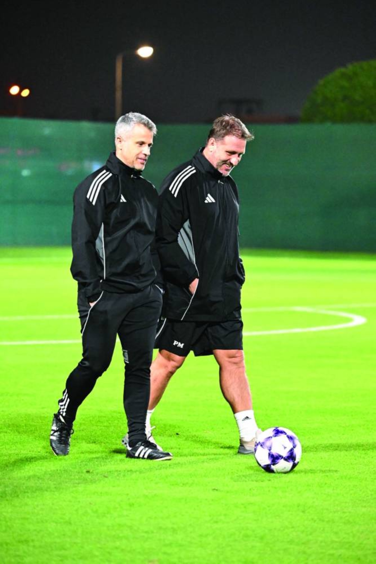 Al Gharafa head coach Pedro Martinez (right) during a training session.
