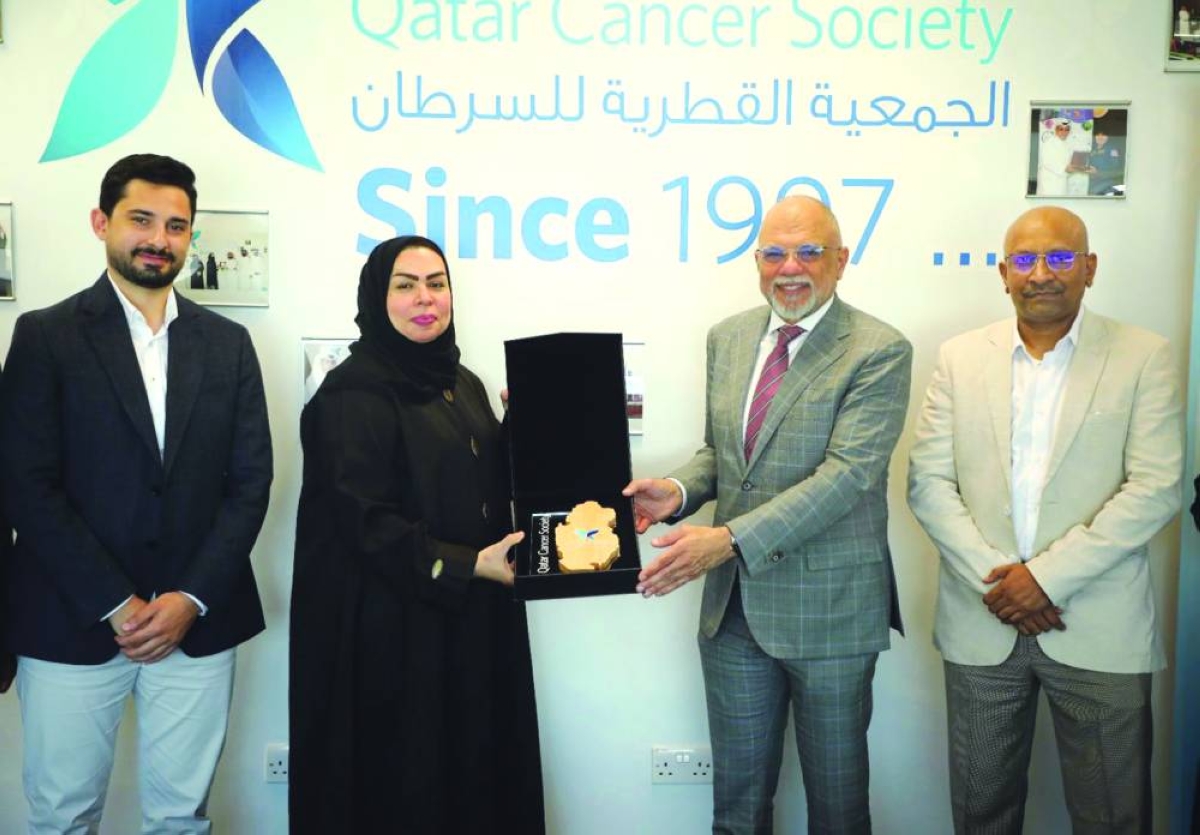 
QCS and FHH officials at the signing ceremony. 