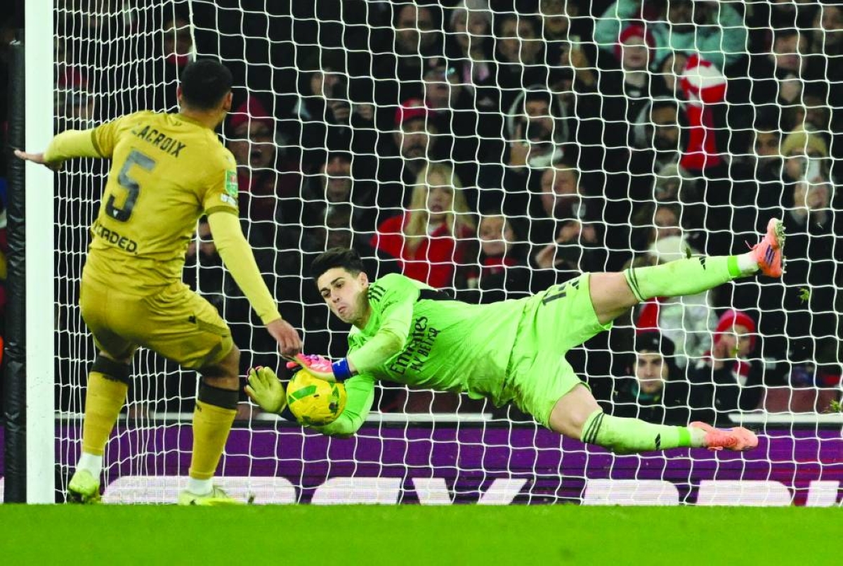 
Arsenal’s Kepa Arrizabalaga saves a penalty from Crystal Palace’s Maxence Lacroix during the shootout in the League Cup quarter-final at the Emirates Stadium in London. (Reuters) 