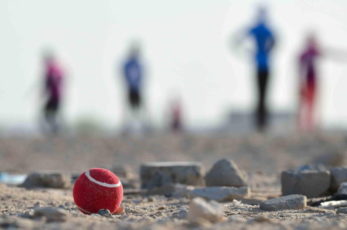 To adapt to hard surfaces, players opt for tennis balls instead of standard cricket balls. 
Photo: Shiraz Sithara.