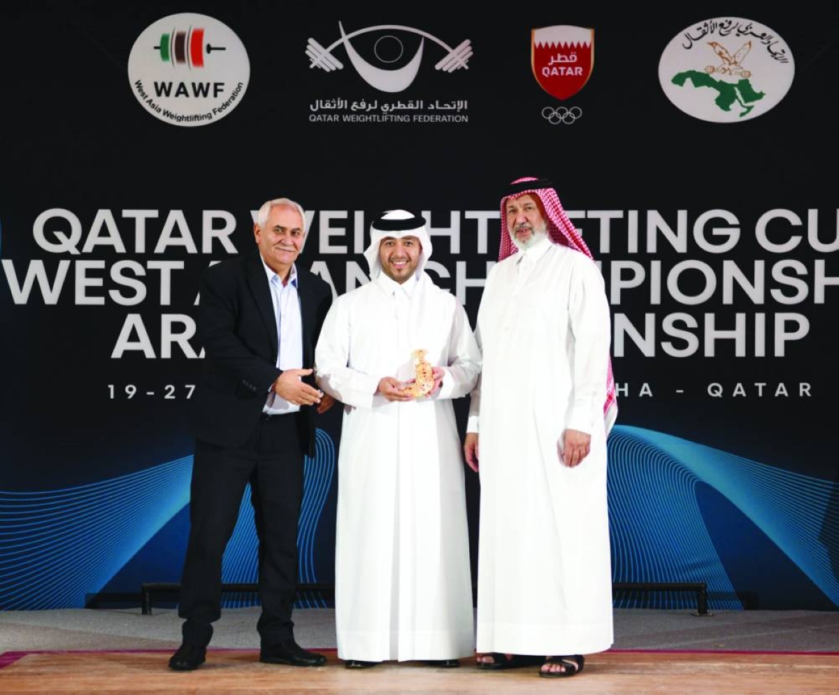 
Mohammed bin Yousef al-Mana, President of the Qatar Weightlifting Federation with Jassim Ibrahim al-Mansouri, Secretary-General of QWF. 