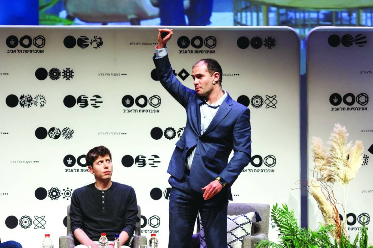 Sam Altman (left), CEO of Microsoft-backed OpenAI and ChatGPT creator listens to Ilya Sutskever, co-founder and Chief Scientist of OpenAI. -- Reuters