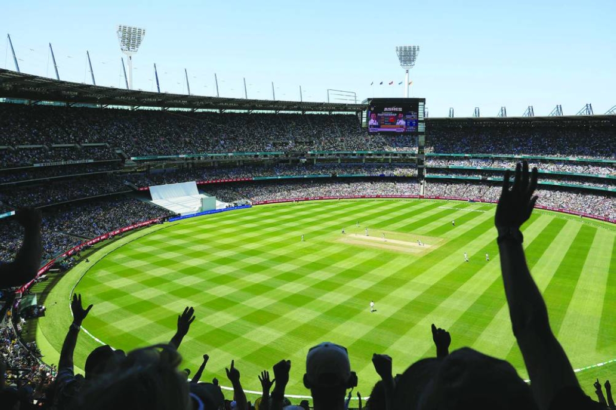 Fans cheer as England's Ben Duckett is dismissed during the second day of the fourth Ashes cricket Test match between Australia and England at the Melbourne Cricket Ground (MCG) in Melbourne on December 27, 2025. (Photo by Martin KEEP / AFP) / -- IMAGE RESTRICTED TO EDITORIAL USE - STRICTLY NO COMMERCIAL USE --
