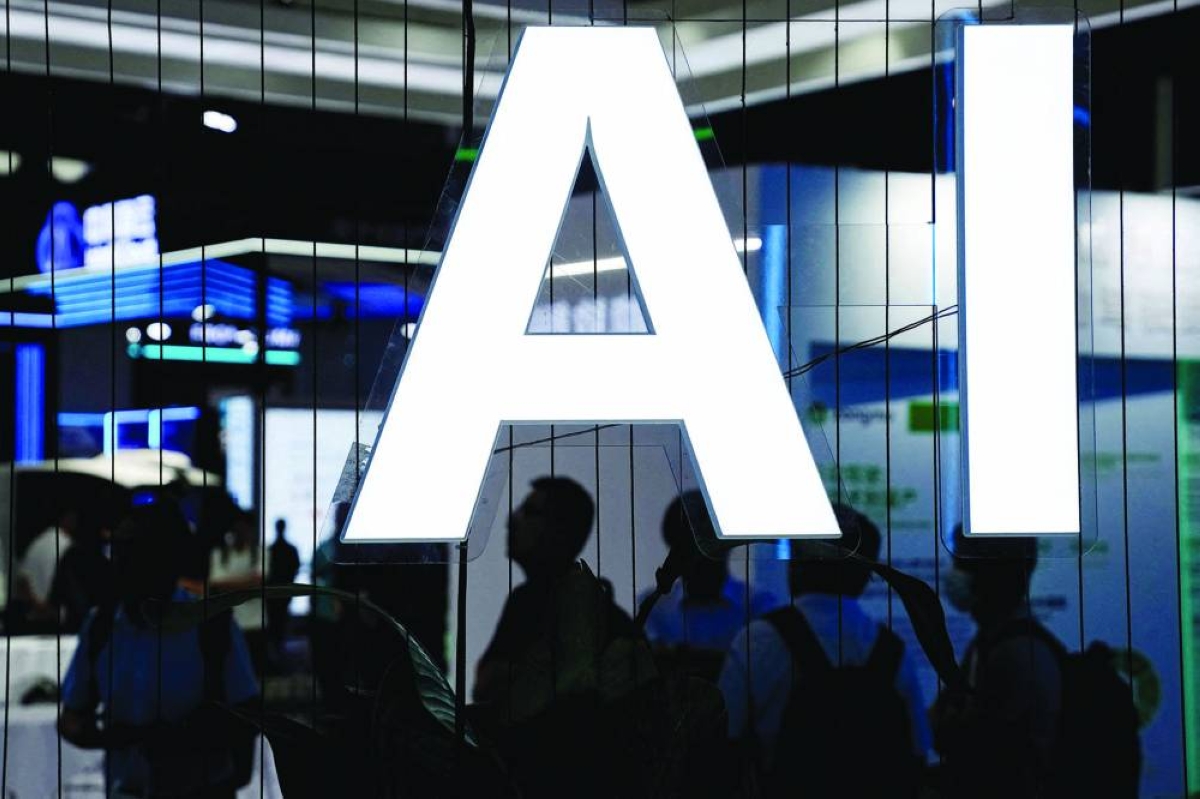 An AI sign is seen at an artificial intelligence conference in Shanghai (file). China's President Xi Jinping has been calling for a "whole nation" effort to build a fully self-sufficient domestic semiconductor supply chain that involves thousands of engineers and scientists at companies and research ‍centers nationwide.