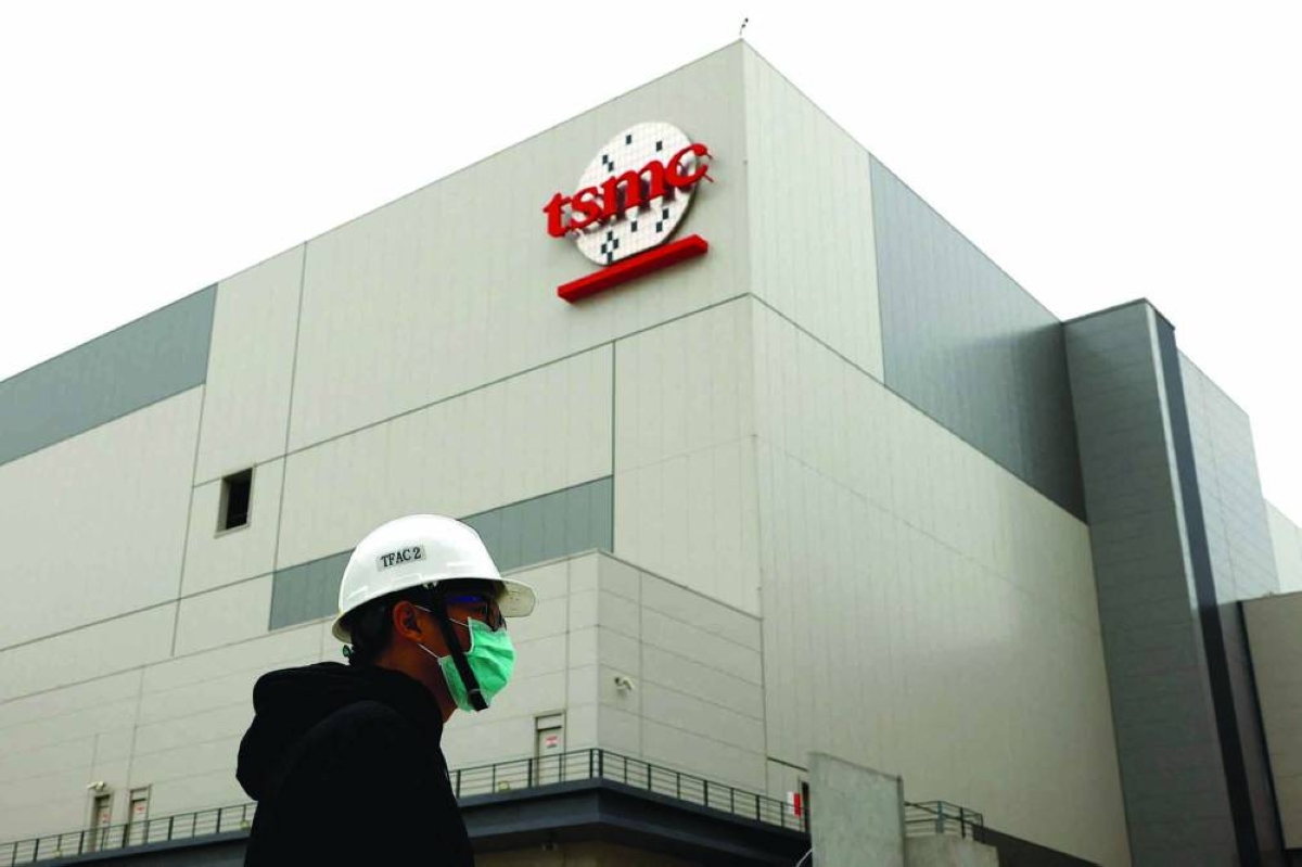 A logo of Taiwanese chip giant TSMC is seen at southern Taiwan science park in Tainan. TSMC is the world's largest contract maker of chips, used in everything from smartphones to missiles, and counts Nvidia and Apple among its clients.