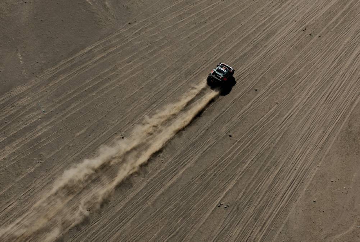 Dacia Sandriders' Nasser al-Attiyah and his co-pilot Fabian Lurquin in action. (Reuters)