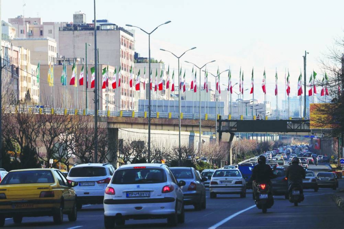 This photo taken Sunday shows a view of highway traffic west of Tehran towards the summit of Mount Damavand, Iran’s highest peak and a potentially-active strato-volcano, in the northern province of Mazandaran.