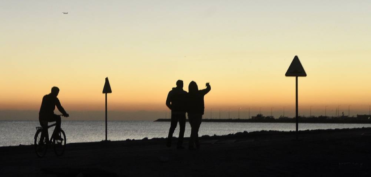 Residents enjoy a morning walk by the Doha waterfront as cooler winter temperatures settle across Qatar, turning seaside strolls and bike rides into a seasonal favourite.