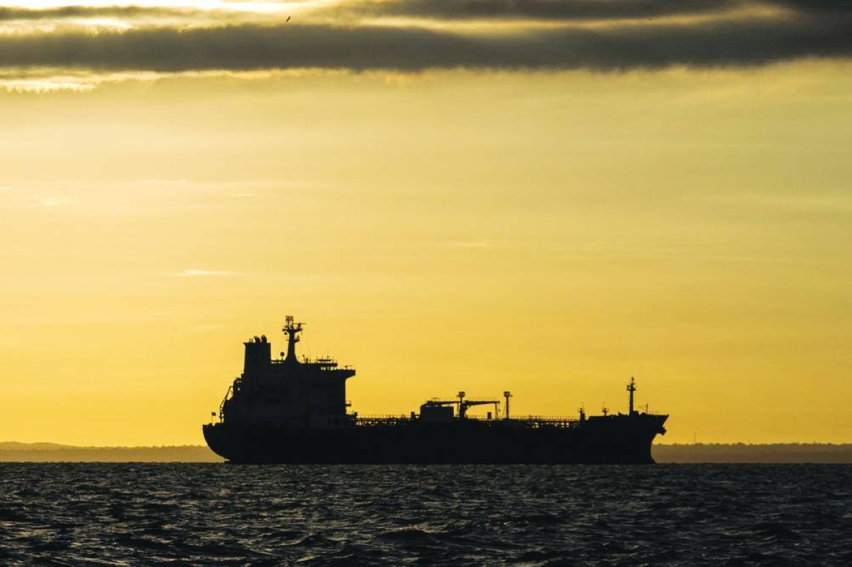 A crude oil tanker sits anchored on Lake Maracaibo, Venezuela on Wednesday. Between US demands for its crude, tankers threatened with seizure, storage tanks at overflow risk and bewildered local authorities, the outlook for Venezuela's oil industry has never been murkier.