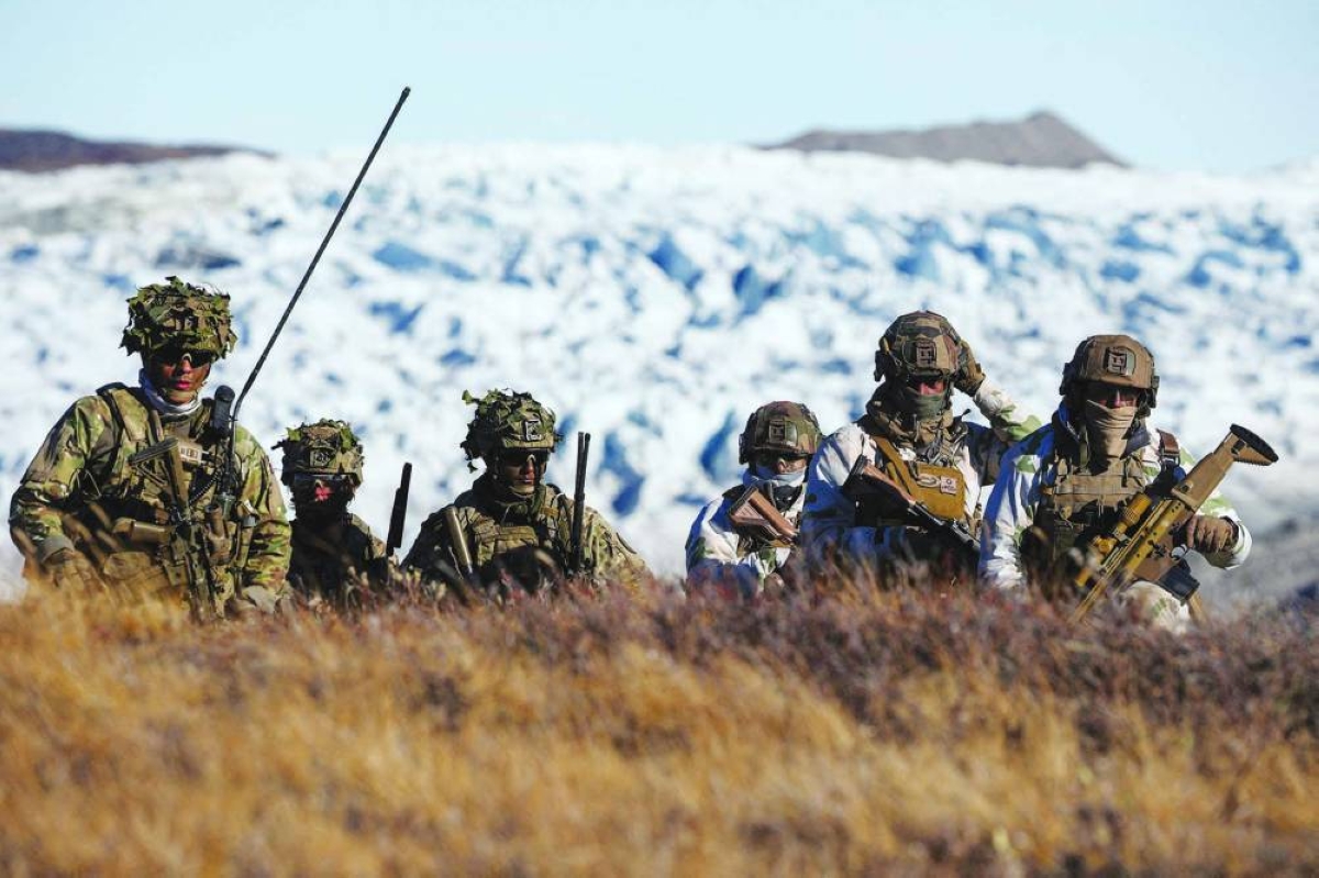 This picture taken on September 17 last year shows members of the Danish armed forces practice looking for potential threats during a joint military drill involving Danish, Swedish and Norwegian home guard units together with Danish, German and French troops, in Kangerlussuaq, Greenland.  Reuters