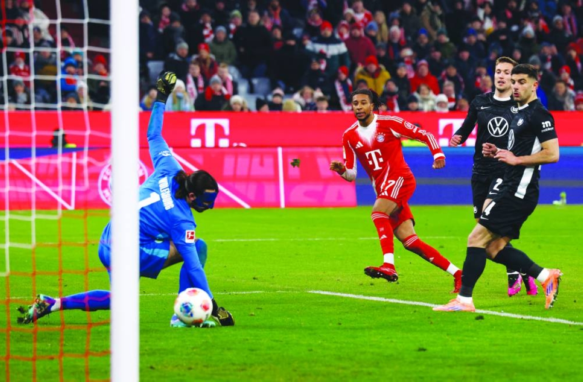 
Bayern Munich’s Michael Olise scores against Wolfsburg. (Reuters) 