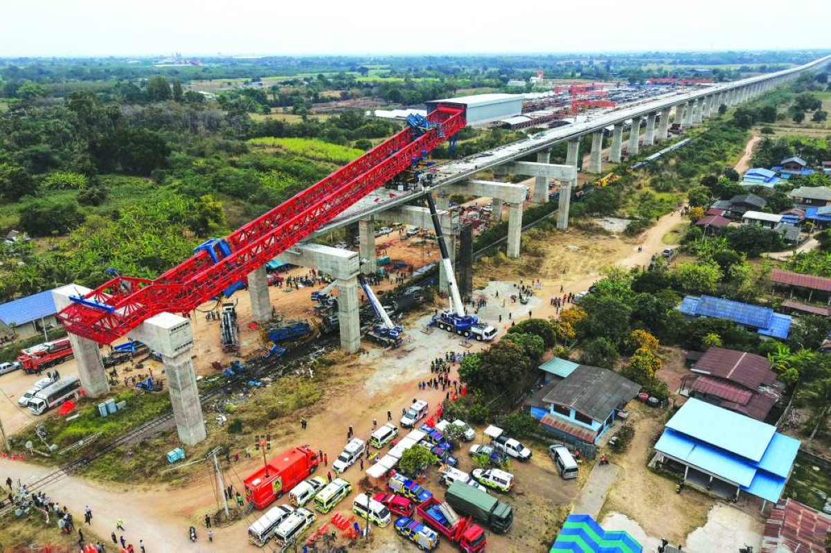 An aerial view of the wreckage of a train that crashed when a construction crane collapsed in Thailand's Nakhon Ratchasima province Wednesday.
