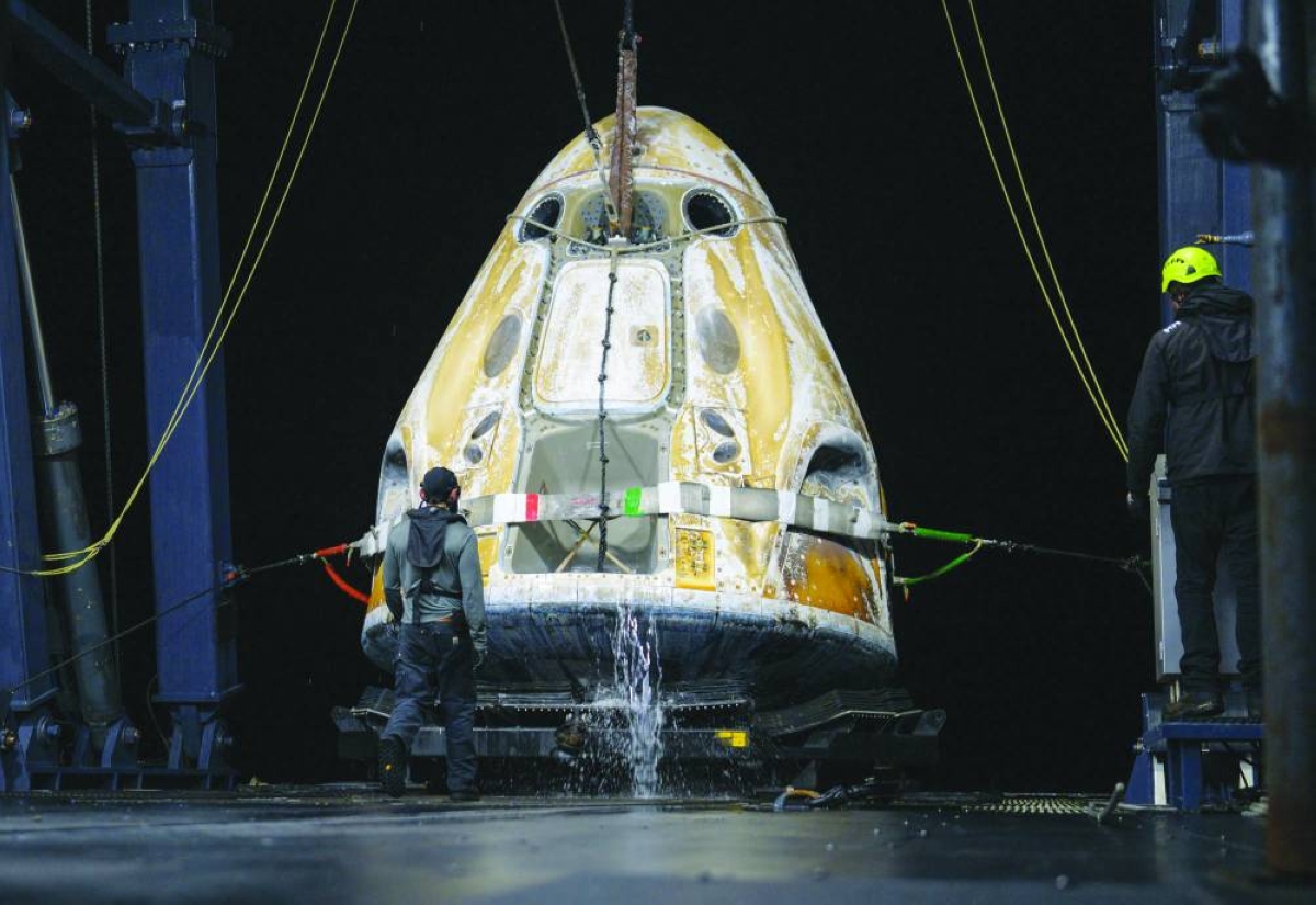 Support teams onboard the SpaceX recovery ship SHANNON work around the SpaceX Dragon Endeavour spacecraft shortly after it landed with Nasa astronauts Zena Cardman, Mike Fincke, JAXA (Japan Aerospace Exploration Agency) astronaut Kimiya Yui, and Roscosmos cosmonaut Oleg Platonov aboard in the Pacific Ocean off the coast of Long Beach, California. – AFP