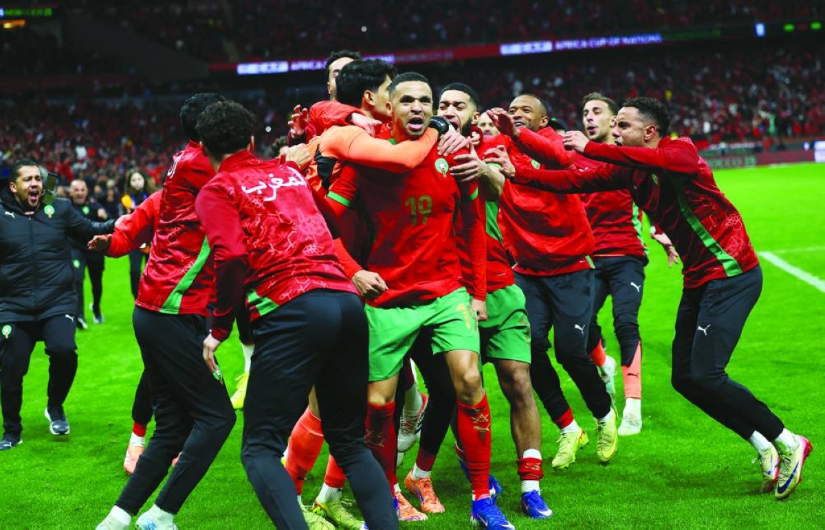 Soccer Football - CAF Africa Cup of Nations - Morocco 2025 - Semi Final - Nigeria v Morocco - Prince Moulay Abdellah Stadium, Rabat, Morocco - January 14, 2026
Morocco players celebrate after winning the match in the penalty shootout. REUTERS