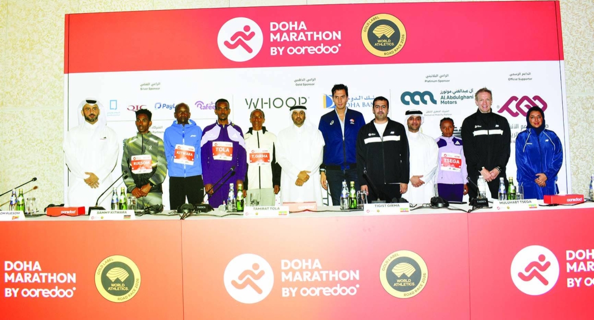 Elite runners from three continents, including paraplegic athlete Richard Whitehead (2nd from right), at the press conference Thursday.