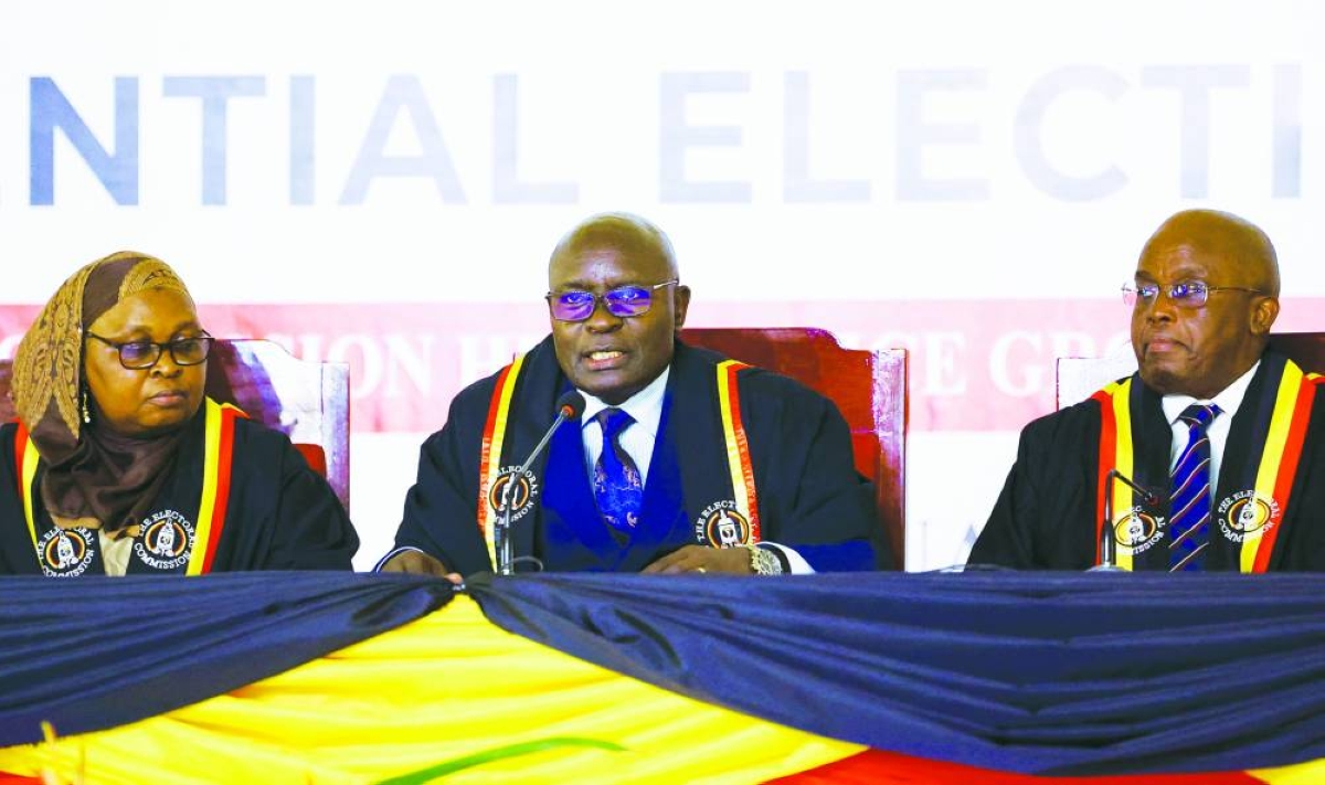 Ugandan Electoral Commission (EC) Chairperson Justice Simon Byabakama announces the final presidential results following the general elections at the Tally Centre in Lubowa, Wakiso district near Kampala, Saturday,