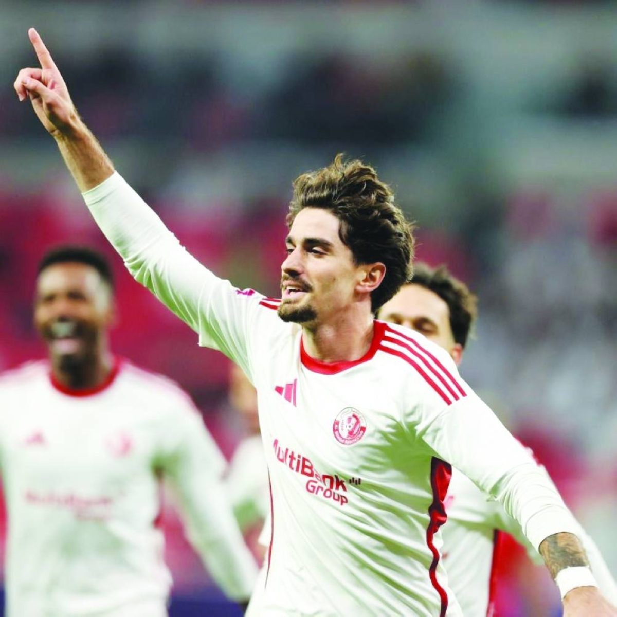 Al Shamal's Spanish midfielder Alex Collado celebrates after scoring against Qatar SC in the Qatar Stars League at the Ahmad Bin Ali Stadium on Saturday.