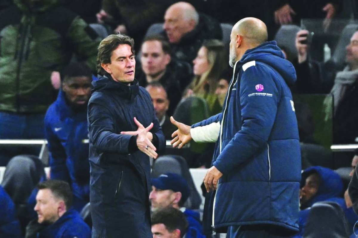 Tottenham Hotspur's head coach Thomas Frank (left) shakes hands with West Ham United's head coach Nuno Espírito Santo after the Premier League match at the Tottenham Hotspur Stadium in London. (AFP) 
