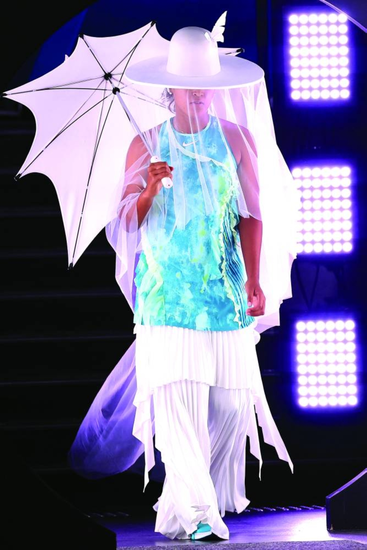 Japan's Naomi Osaka walks on court to play against Croatia’s Antonia Ruzic in Melbourne Tuesday. (AFP)
