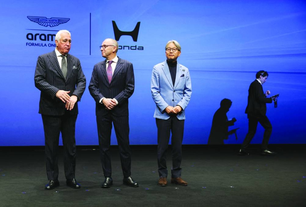 Aston Martin Aramco Formula One Team Executive Chairman Lawrence Stroll, Formula One Group President and F1 CEO Stefano Domenicali and Honda CEO Toshihiro Mibe during their joint press conference on their partnership launch announcement in Tokyo Tuesday. (Reuters)