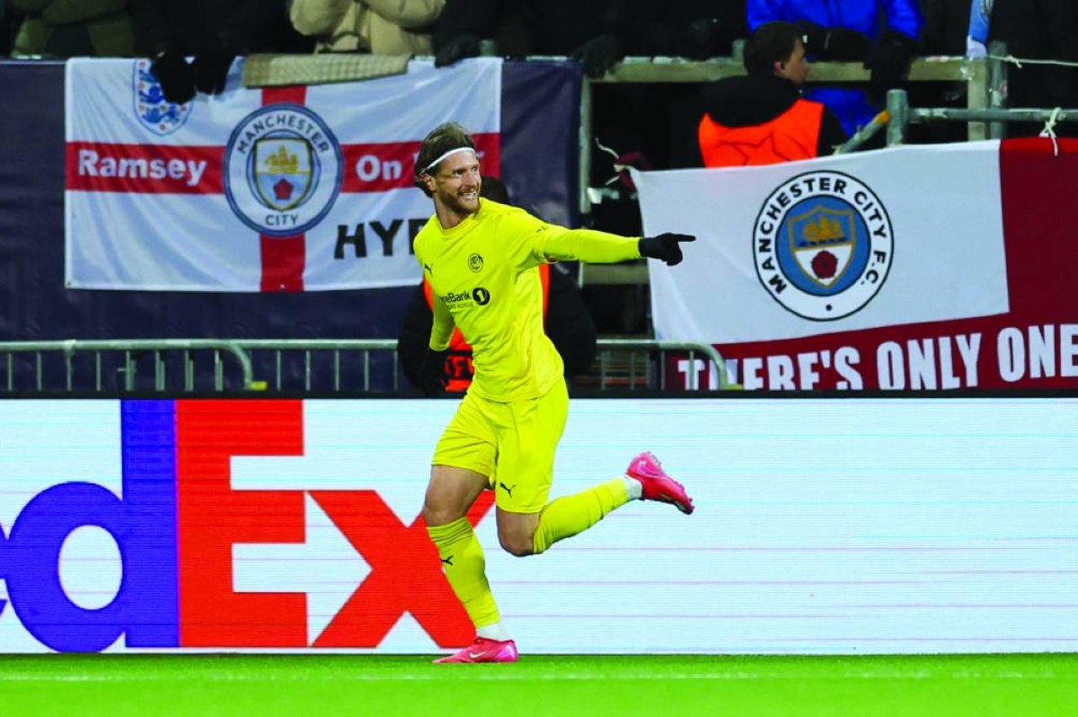 Bodo/Glimt’s Kasper Hogh celebrates after scoring against Manchester City.