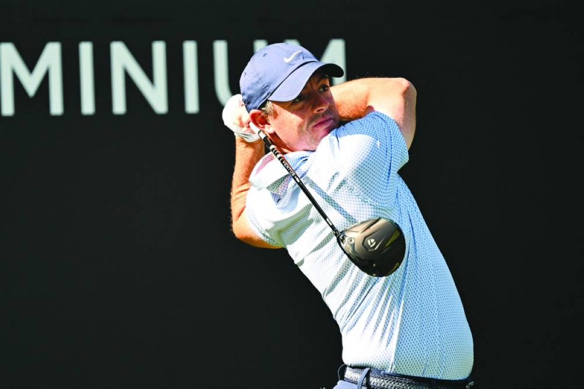 Rory McIlroy of Northern Ireland plays a shot on the 5th hole during the first day of the Hero Dubai Desert Classic at the Emirates Golf Club in Dubai Thursday. (AFP)