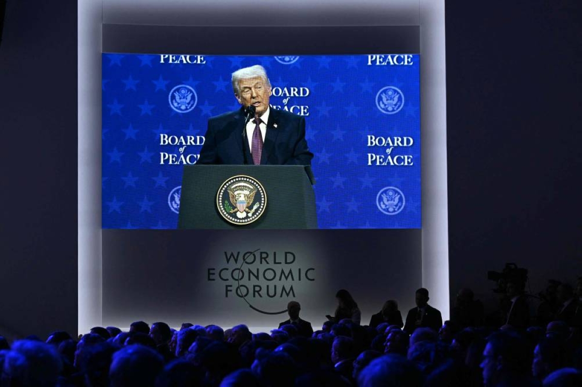 US President Donald Trump is seen on a giant screen as he speaks at the "Board of Peace" meeting during the World Economic Forum (WEF) annual meeting in Davos on January 22, 2026. US President Donald Trump will show off his new "Board of Peace" at Davos on January 22, 2026, burnishing his claim to be a peacemaker a day after backing off his own threats against Greenland. Originally meant to oversee the rebuilding of Gaza after the war between Hamas and Israel, the board's charter does not limit its role to the Strip and has sparked concerns that Trump wants it to rival the United Nations. (AFP)