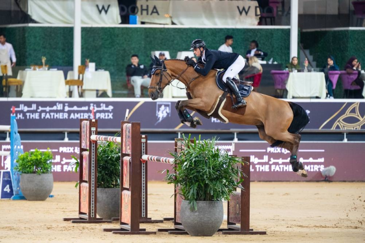 Germany's Christopher Kläsener onboard Popeye Vd Bisschop clears a rail in the CSI5* 155cm jump-Off during the the third round of the HH The Father Amir's Prix at Al Shaqab yesterday,