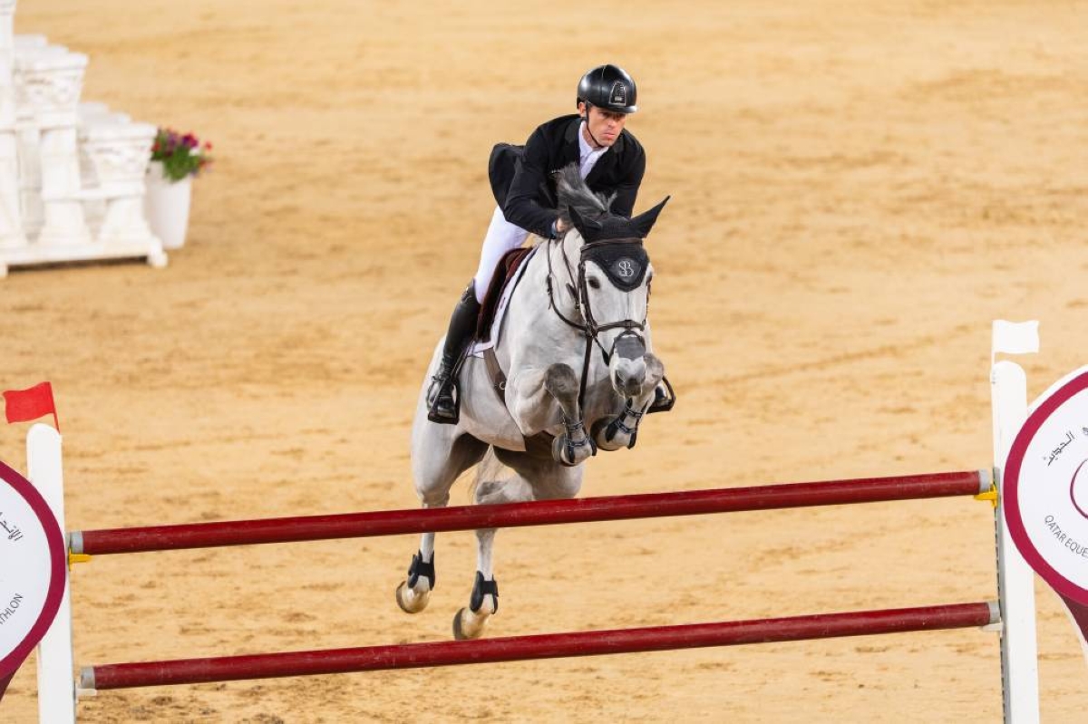 Scott Brash clears a rail with 11-year-old mare Hello Mango during the third round of HH The Father Amir’s Prix at Al Shaqab Saturday.