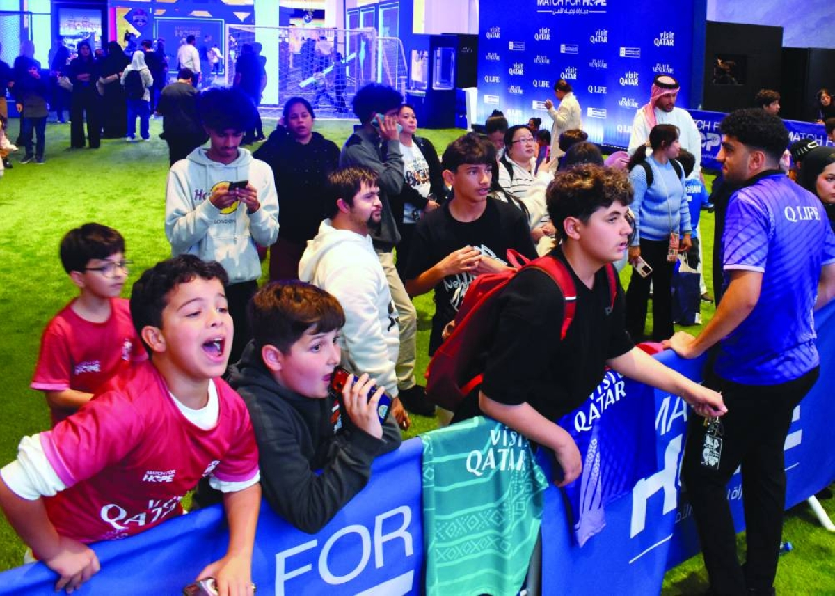 Young football fans enjoying the Match for Hope 2026 Fan Village at Place Vendome.
