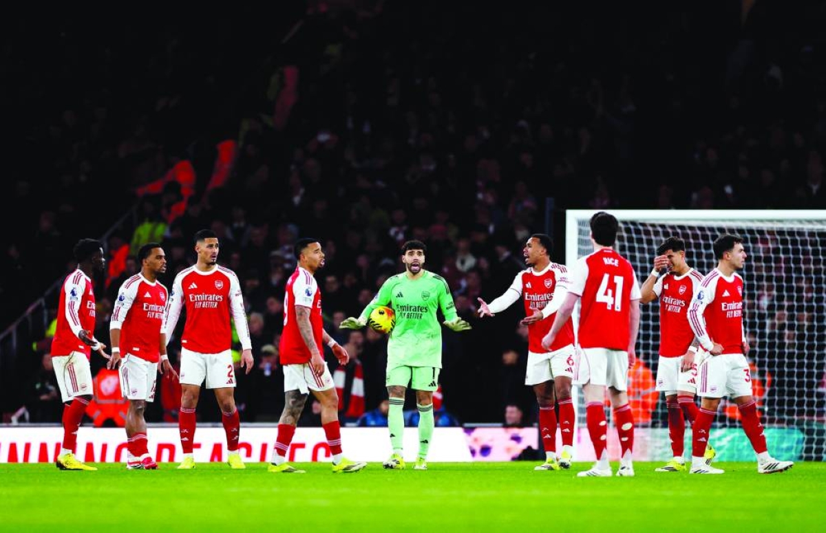 
Arsenal’s David Raya reacts with teammates after Manchester United’s Patrick Dorgu scores their second goal in their Premier league match on Sunday. (Reuters) 