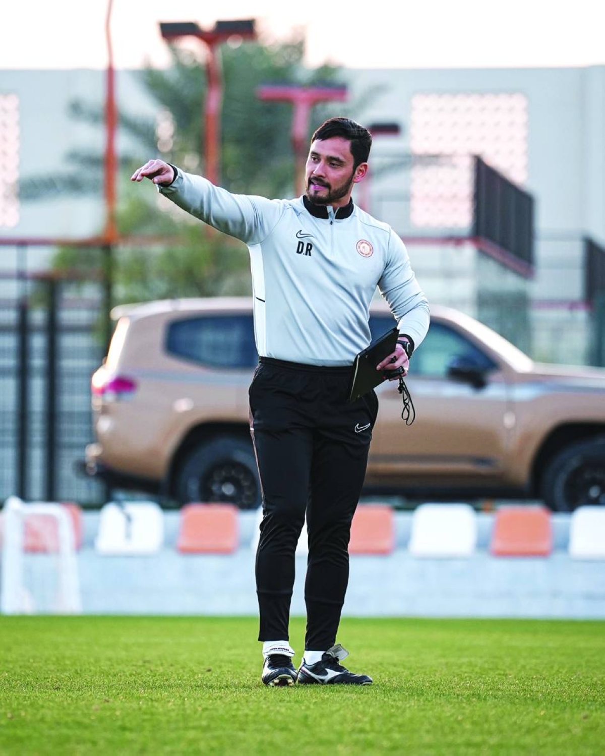 Umm Salal's new coach Danilo Roper (left) and Al Arabi manager Cosmin Contra at a practice session Wednesday.