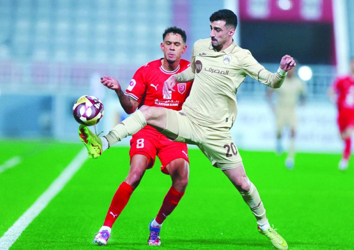 Al Rayyan and Al Duhail players battle for the ball at the Abdullah Bin Khalifa Stadium yesterday.