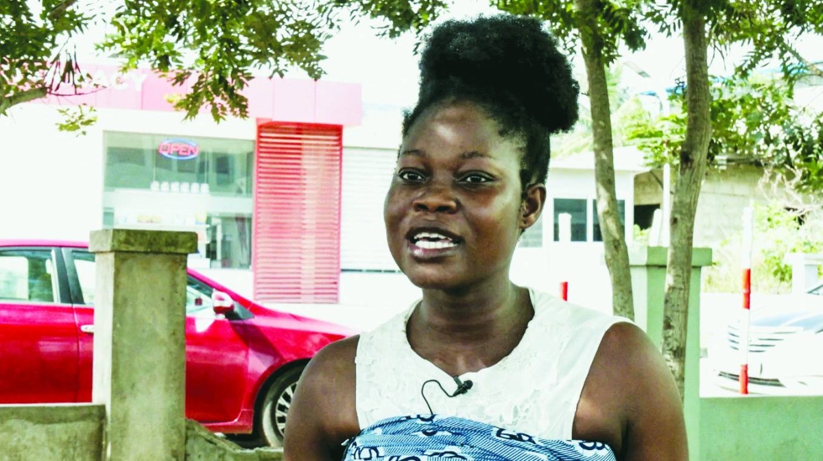 
A screengrab obtained from video shows Esther Kolan, a mother of a child vaccinated against malaria, during an interview with Reuters in the southern town of Kasoa, Ghana. (Reuters) 