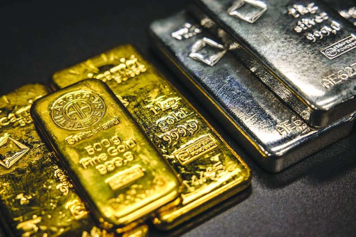 Gold and silver plunge as wild swings rock metals markets