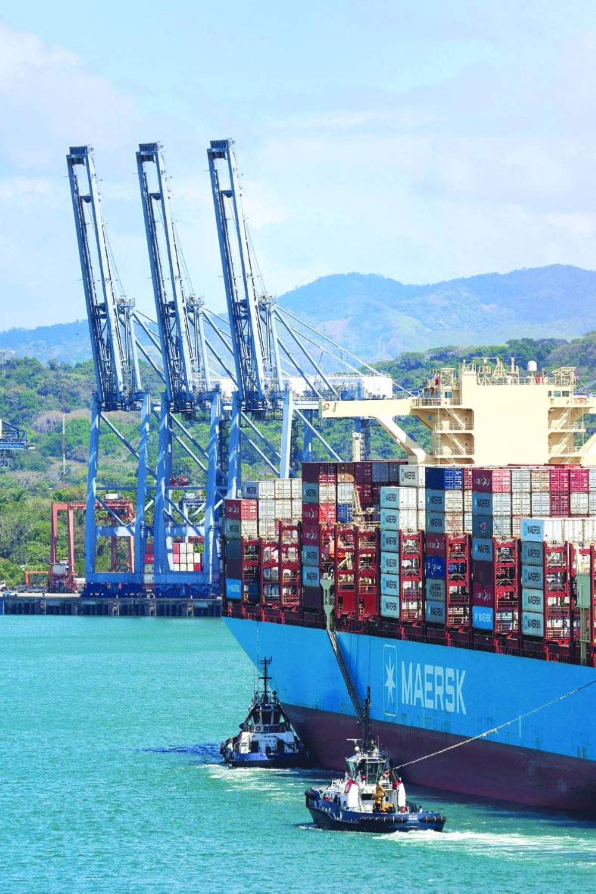 A container ship Maersk El Alto is guided by tugboats at Panama Ports Company. Maersk will temporarily take over operation of two ports on the Panama Canal from Hong Kong company CK Hutchison, whose concession has been annulled, the Panama Maritime Authority said on Friday.