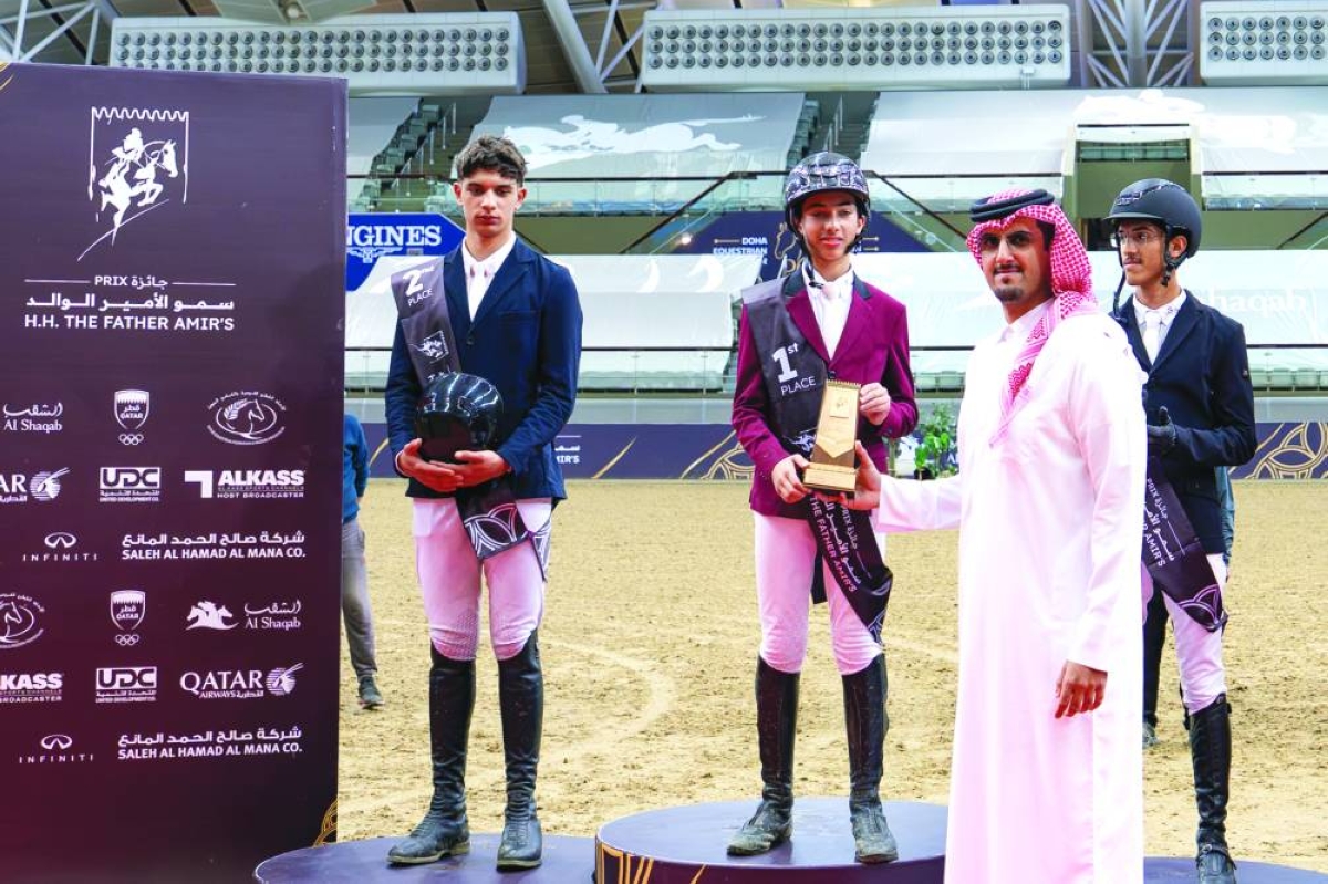 Assistant Deputy Director of the Doha Equestrian Tour Sheikh Talal bin Khalid al-Thani presents the trophy to Qatari rider Ali Omar al-Ansari, who won the CSI1* Grand Prix. Egypt’s Fares Mohamed Fared finished second, while Mohammed Yousef al-Jaber of Qatar was third.