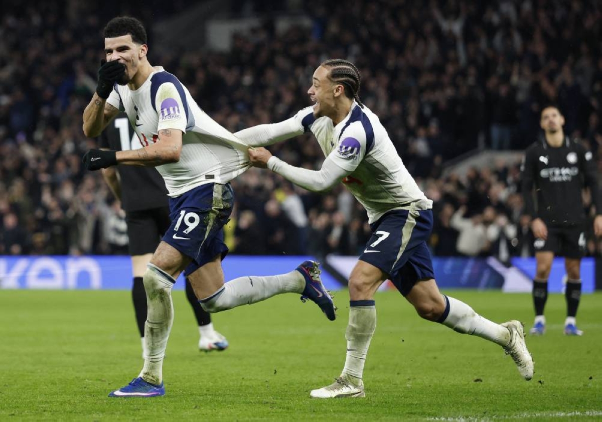 Tottenham Hotspur's Dominic Solanke celebrates scoring their second goal with Xavi Simons against Manchester City in London Sunday. (Reuters)