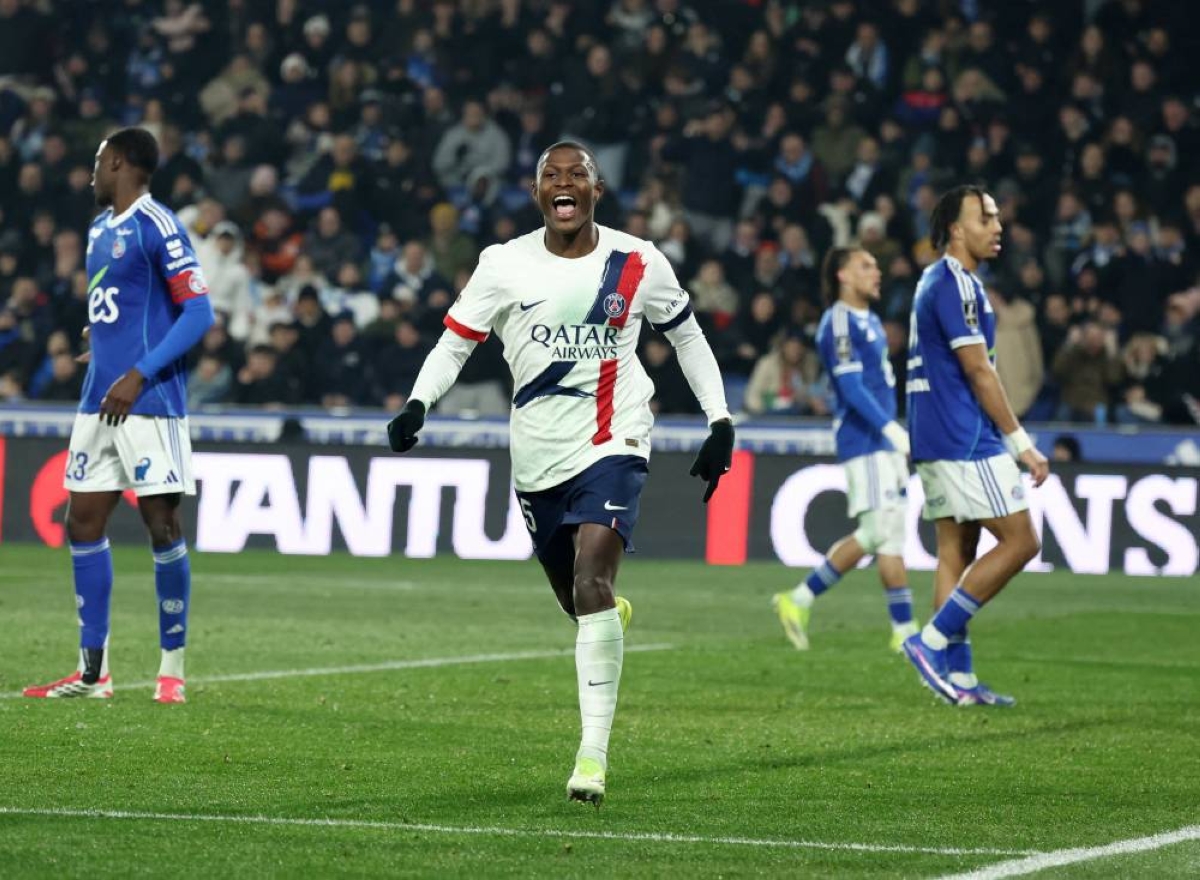 Paris St Germain's Nuno Mendes celebrates scoring their second goal against Strasbourg in the Ligue 1 match. (Reuters)