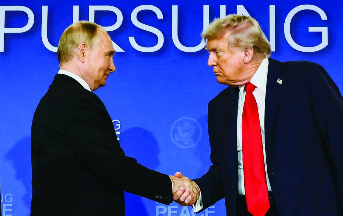 
US President Donald Trump and Russian President Vladimir Putin shake hands during a press conference following their meeting to negotiate an end to the war in Ukraine, at Joint Base Elmendorf-Richardson, in Anchorage, Alaska, on August 15, 2025. (Reuters/File Photo) 