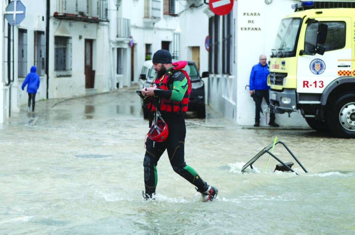 Emergency personnel get ready to carry out a total evacuation of the town of Grazalema, southern Spain, Thursday, amid Storm Leonardo.(AFP)