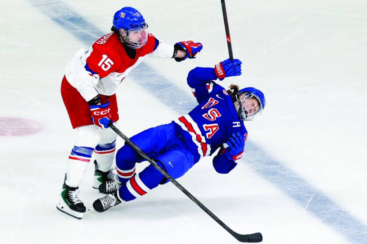 Milano Cortina 2026 Olympics - Ice Hockey - Women's Preliminary Round - Group A - United States of America vs Czech Republic - Milano Rho Ice Hockey Arena, Milan, Italy - February 05, 2026.
Alex Carpenter of United States in action with Andrea Trnkova of Czech Republic. REUTERS