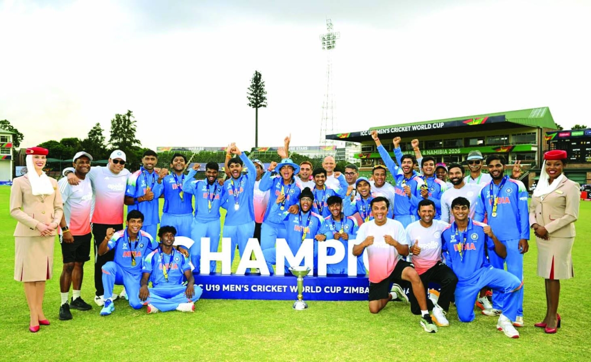 
Indian players and team officials celebrate winning the ICC U-19 World Cup final against England. 