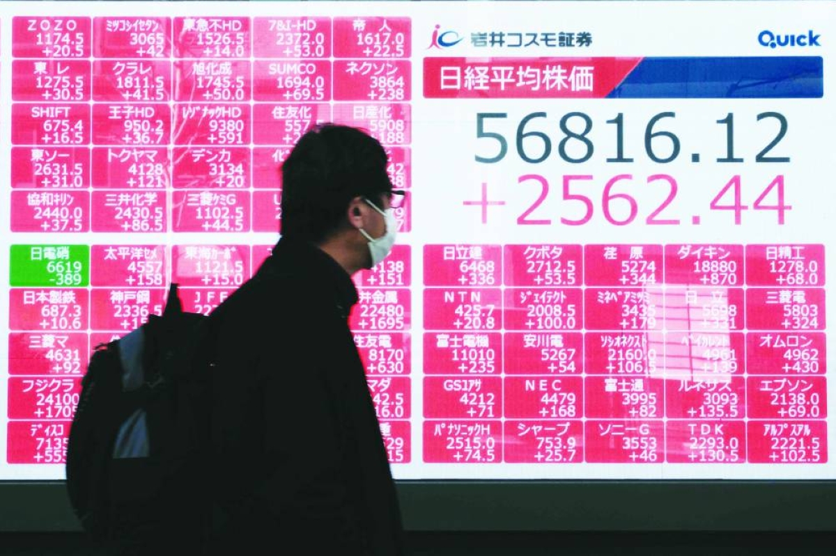 Asian markets track Wall Street rally as Tokyo hits record