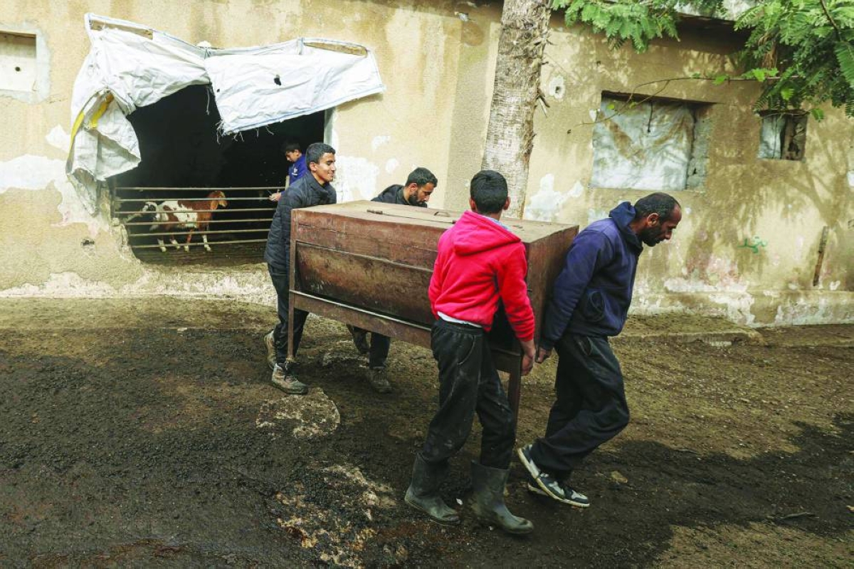 Bedouins gather their belongings on February 9, 2026, after residents of the town or Arraba, south of Jenin, in the occupied West Bank, were allegedly ordered to leave their homes by the Israeli army by the following day. Israel has occupied the West Bank since 1967, and violence there has soared since the Gaza war erupted in October 2023 following Hamas's attack on Israel. The UN reports that thousands of Palestinians from mostly rural communities were displaced as a result of settler violence since October 2023, while Israel's government has approved record numbers of new settlements in the Palestinian territory. All Israeli settlements in the West Bank are considered illegal by the international community. (AFP)